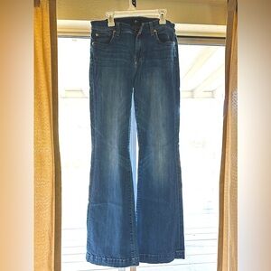 7 brand flair jeans size 30. L is 32, missing some studs on the pockets .